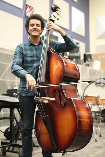 Student playing Bass instrument